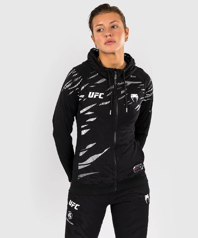 UFC Fusion by Venum Authentic Fight Night Women’s Walkout Hoodie - Black Hoodie with Snap Buttons Easy Quick UFC Fusion by Venum Authentic Fight Night Women’s Walkout Hoodie - Black Hoodie with Snap Buttons Easy Quick